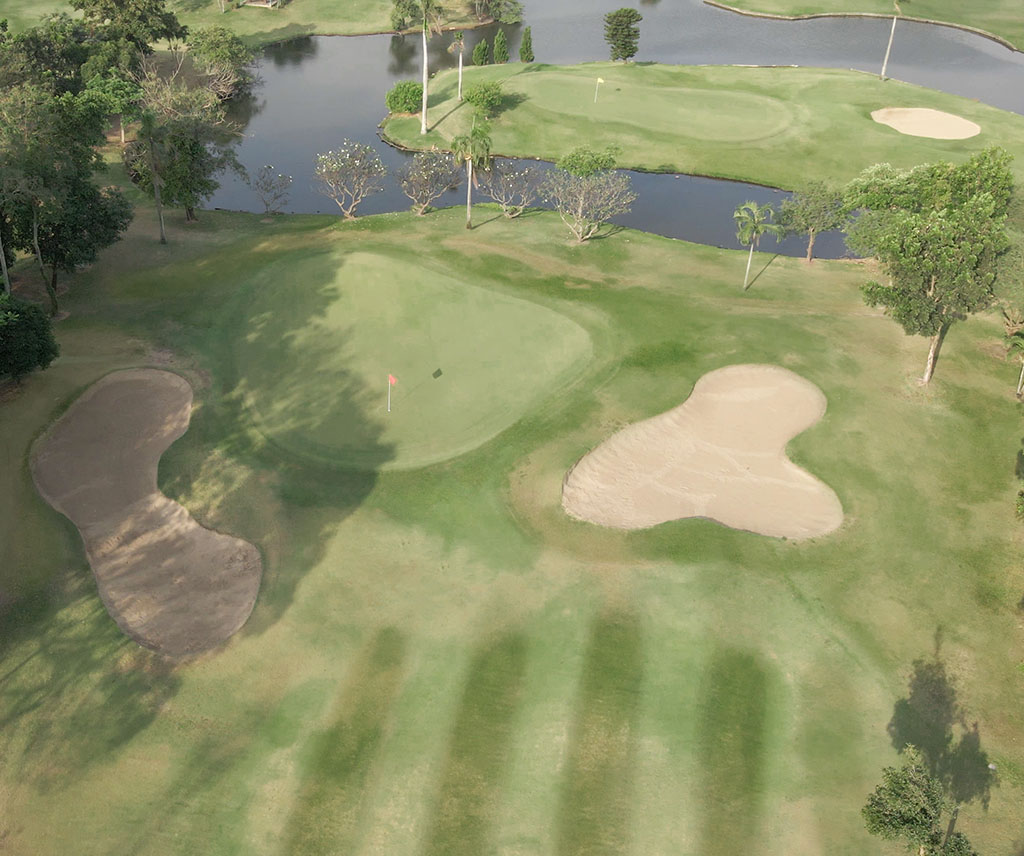 Ekachai Golf and Country Club Bangkok Thailand Course A Hole 1 Green bunkers